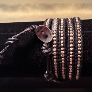 Chan Luu black and silver skull woven leather wrap bracelet.